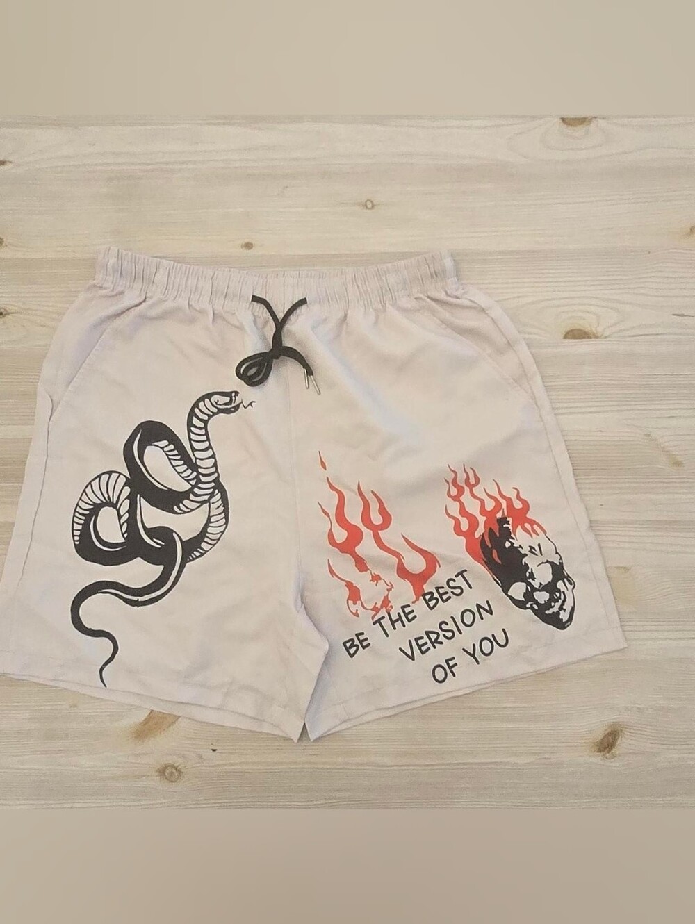 SHEIN Light Beige Athletic Shorts with Black Snake & Red Flame Graphics